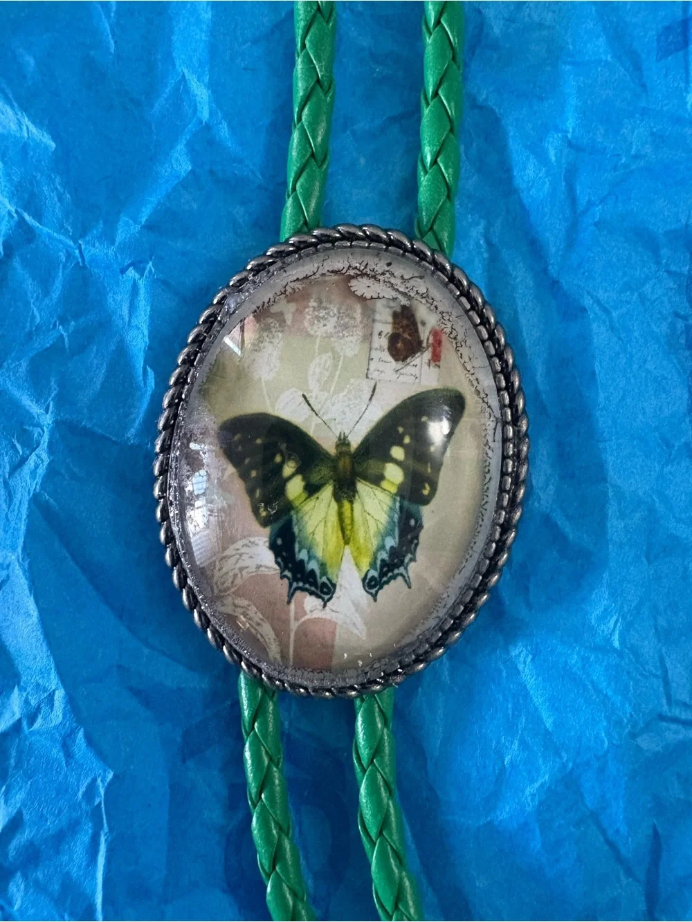Butterfly Glass Cabochon Bolo Tie - Green Cord